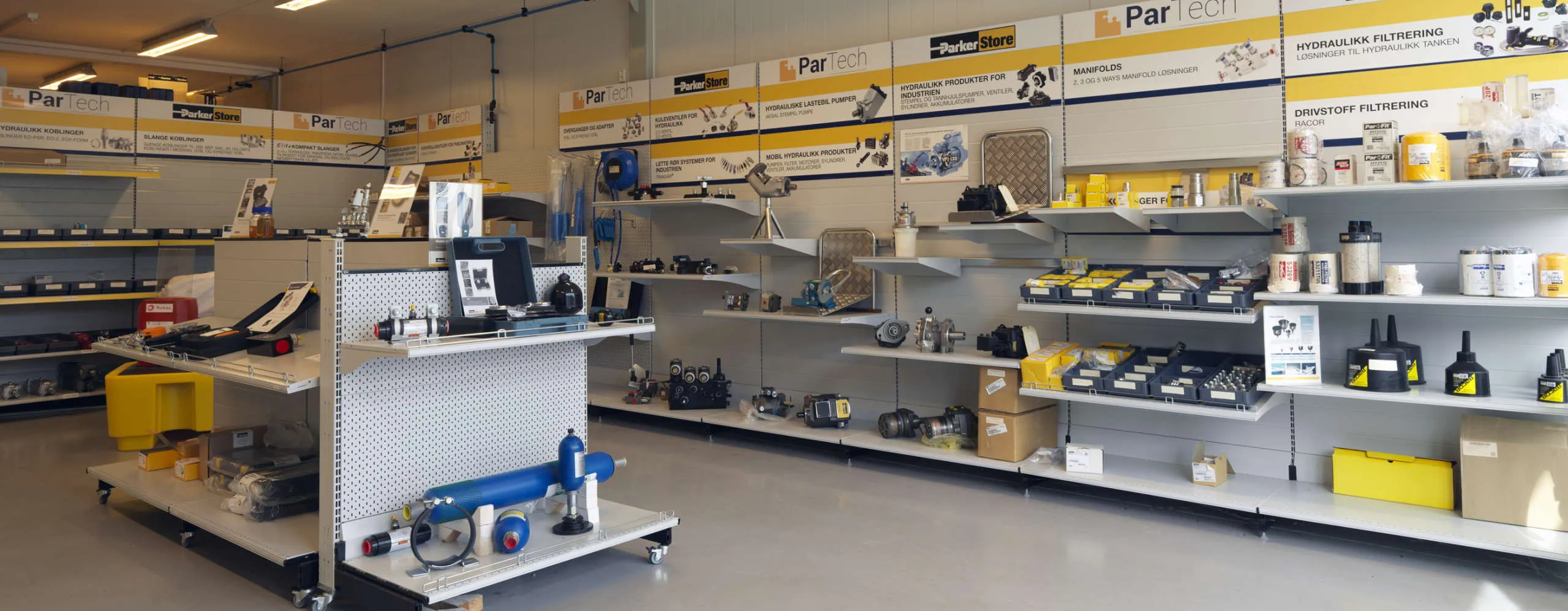 View of our store's interior, showcasing various shelves with hydraulic products